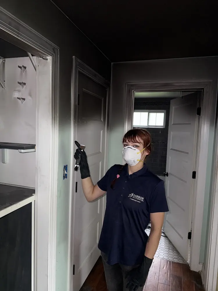 Elite Guardian Mitigation technician in protective gear on a job in Aurora